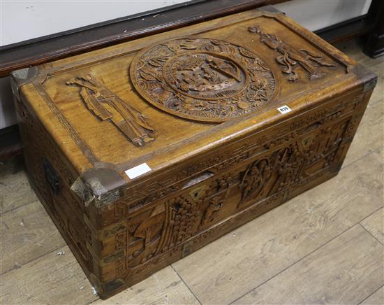A Cantonese carved camphorwood chest, W.91cm